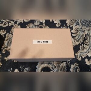 Miu Miu light pink sunglasses box
